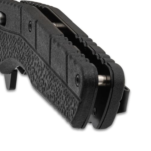 Close-up of textured handle on a folding knife