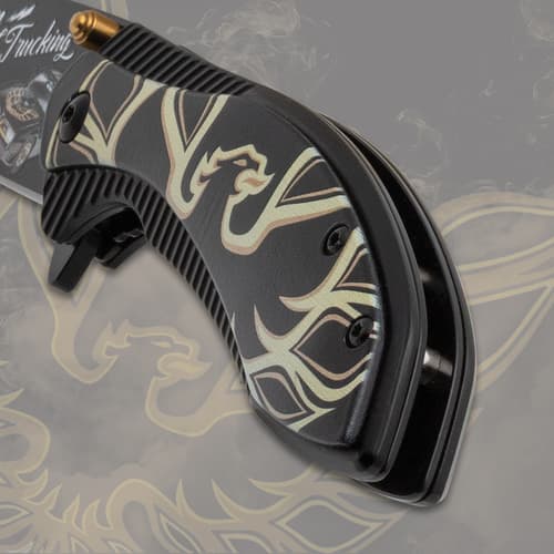 Close-up of folded knife handle with decorative pattern