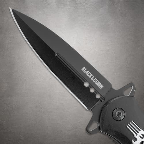 Close view of Black Legion knife blade, highlighting the sharp edge and brand engraving