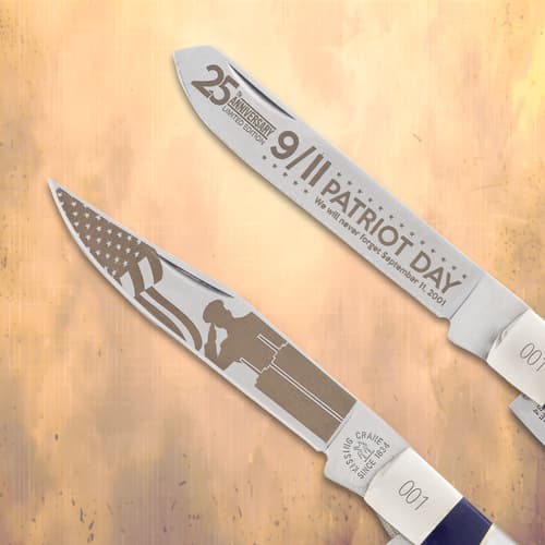 Close-up of two blades with 9/11 Patriot Day engravings