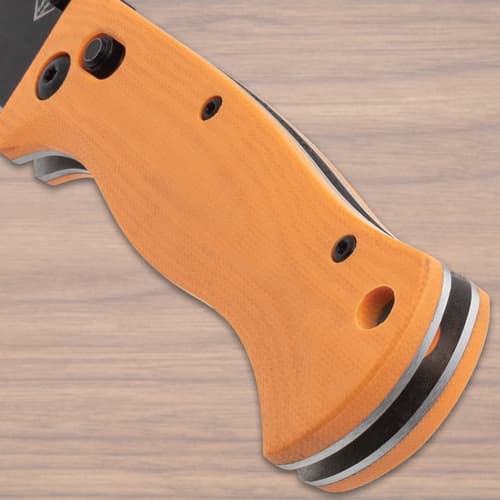 Close-up of orange knife handle with screws