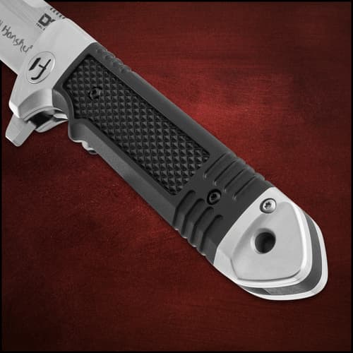 Close-up of Honshu knife handle with textured grip