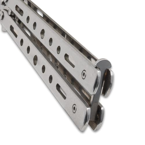 Close-up of closed butterfly knife handle with screws