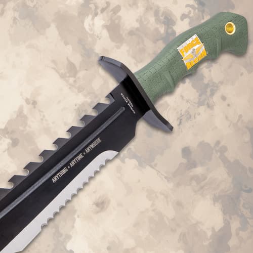 Bowie knife with green handle and engraved blade text