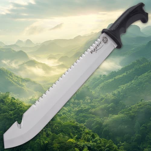 Full view of machete with serrated blade over mountains