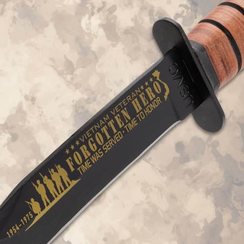 Detailed view of knife blade with Vietnam veteran tribute