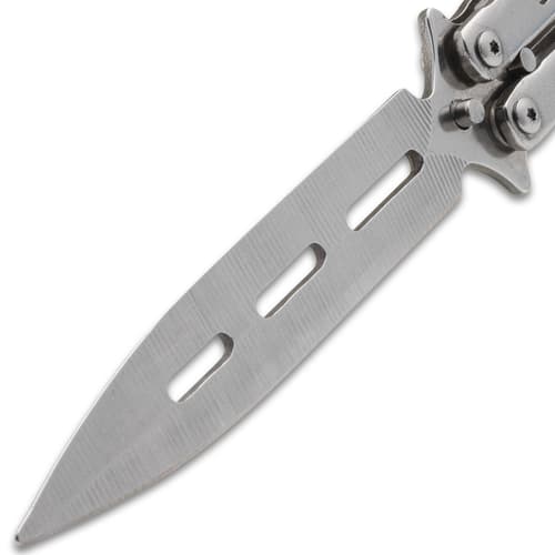 Close-up of silver butterfly knife blade with cutouts