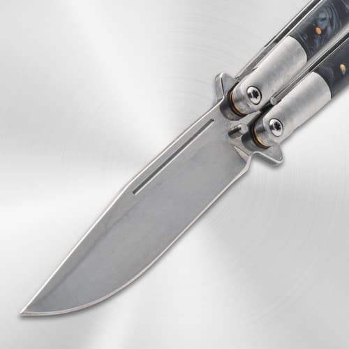 Close-up of butterfly knife blade and pivot area