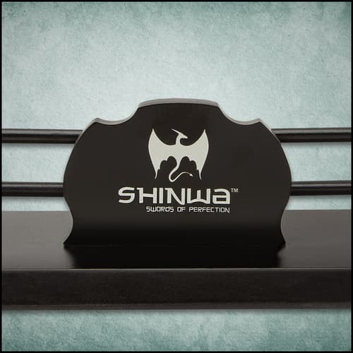 The black two-tier display is shown with two swords on it and the “Shinwa” logo displayed on the front.