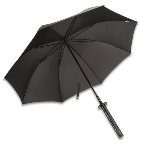 The black nylon umbrella opened and looks like a traditional umbrella.