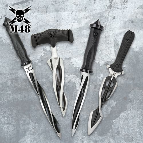 Four tactical knives with black handles on a textured background