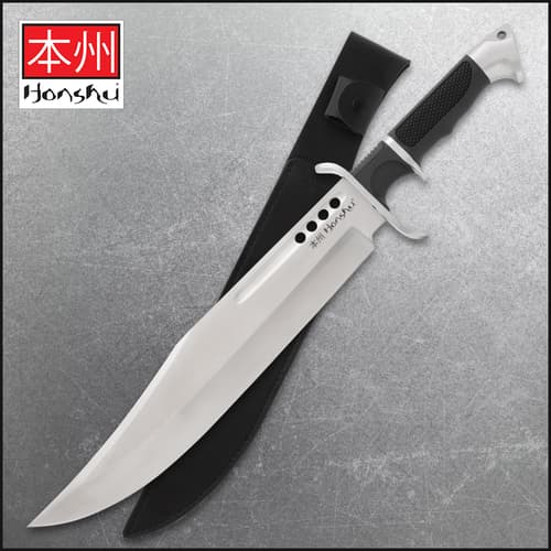 Large knife with black handle and sheath on gray background