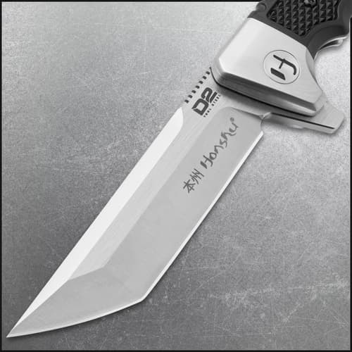 Close-up of Honshu knife blade with D2 steel marking