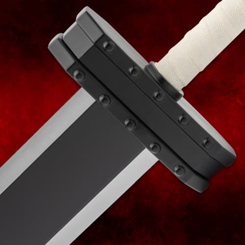 Close-up of sword hilt with black and white details