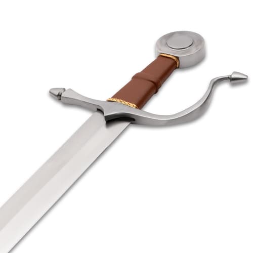Close-up of sword hilt with brown leather grip