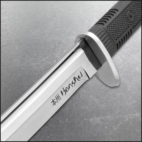 Close view of honshu katana sword encased in black leather sageo