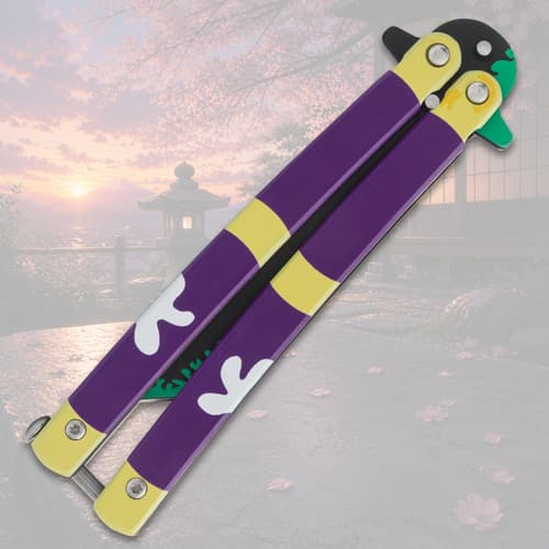 Closed butterfly knife with purple and yellow handle