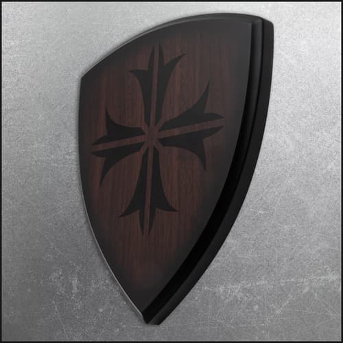 Side view of wooden shield with black cross emblem