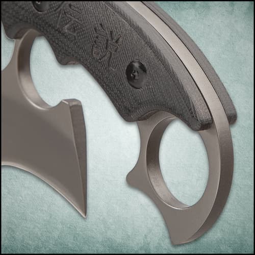 This unique knife has a 5 4/5” 3Cr13 stainless steel blade with non-reflective finish and finger ring holes.