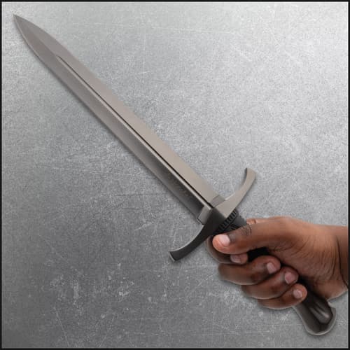 Hand holding Honshu dagger with textured handle