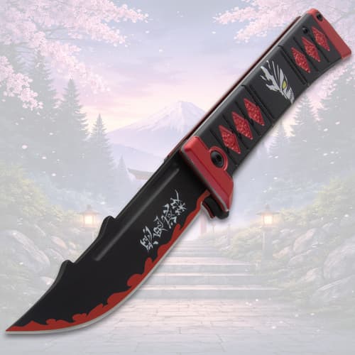 Open knife with red and black design, cherry blossoms background