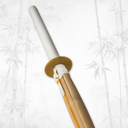 Close-up of bamboo shinai sword handle and guard on bamboo background
