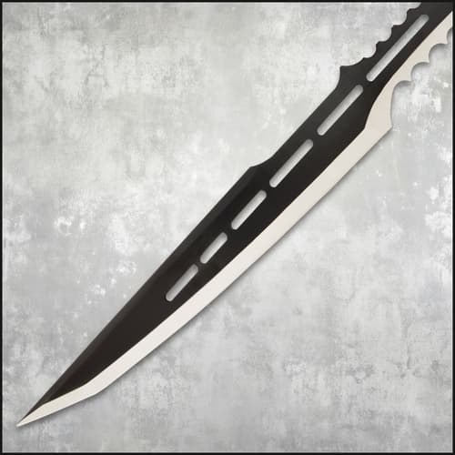 Close-up of sword blade with cutouts