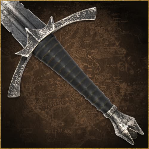 Close-up of sword handle with intricate details