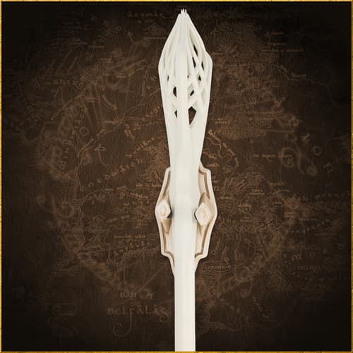 Detailed view of the top section of a white staff