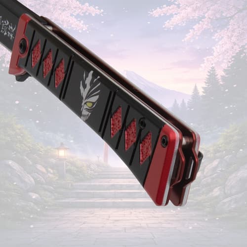 Close-up of knife handle with red accents and anime design