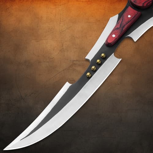 Close-up of sword blade with brass details