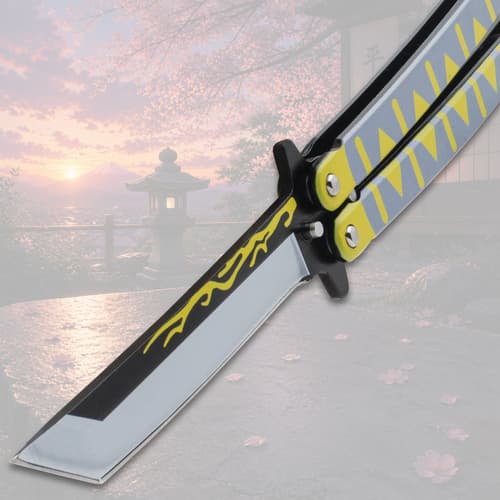 Close-up of butterfly knife blade with decorative design