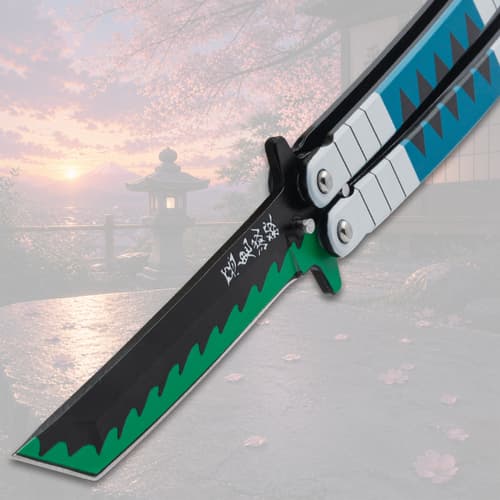Close-up of butterfly knife blade with blue and green design