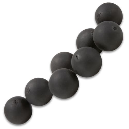 Close-up of black rubber training balls