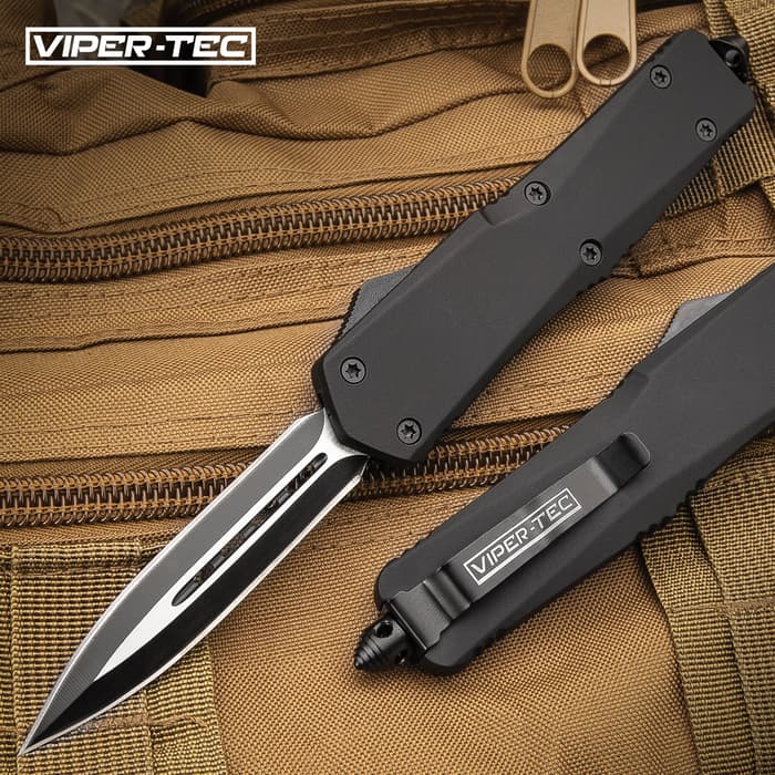 Ghost Series Black Double Edge OTF Knife has a 3 1/2" stainless steel blade and black handle, shown on tactical background.