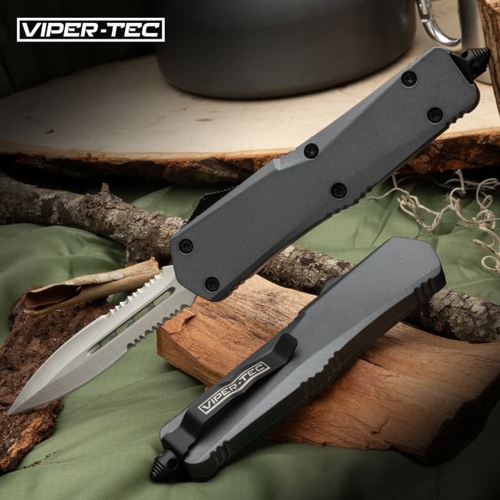 The Viper-Tec Ghost Series Grey Half-Serrated OTF Knife is perfect for those of you who want to carry a full-size knife without the extra bulk but that is still built for hard use