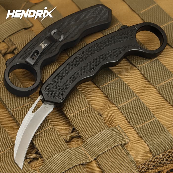 The awesome Karambit OTF Knife from Hendrix Gear is one part karambit and one part double-action OTF