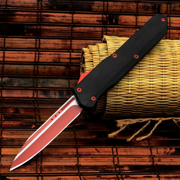 The Red OTF Automatic Knife deployed