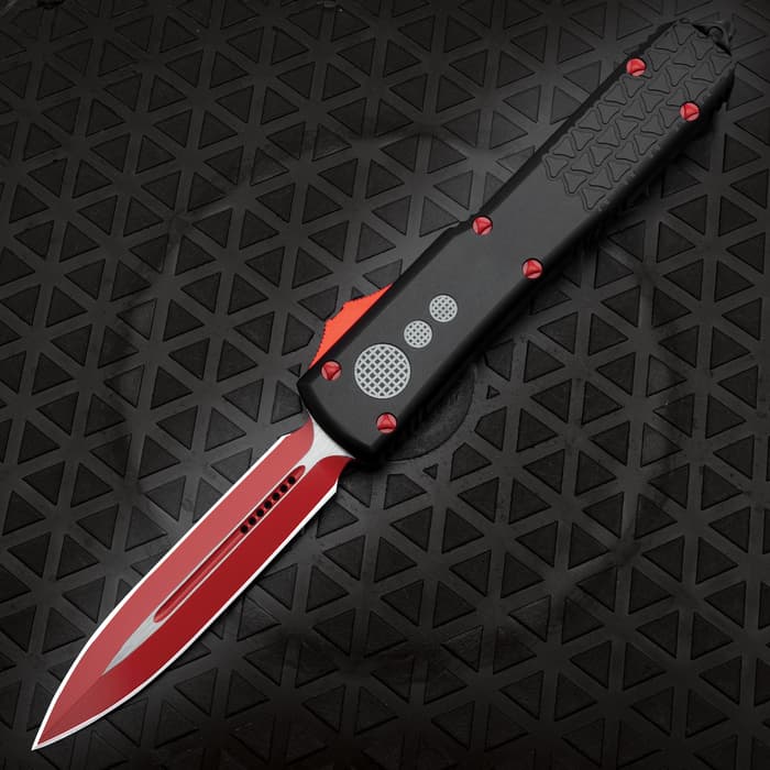 The Digi-Red OTF Automatic Knife with its blade deployed