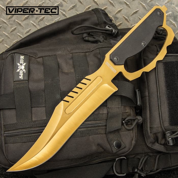 The Gold Raider Trench Knife is a flashy and aggressive fixed blade that, despite its blingy look, will make quick work of any cutting task