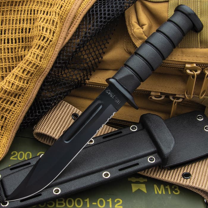 The Vietnam War Black Serrated Bowie And Sheath is just the thing you need at your side for covert operations