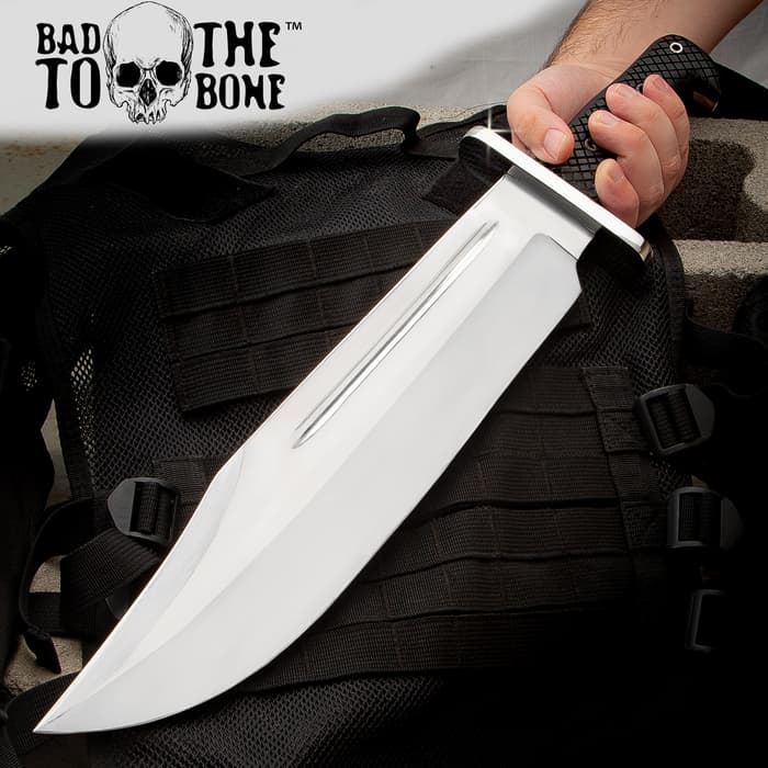 The Behemoth Bowie Knife shown in and out of its sheath
