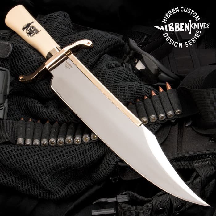 Gil Hibben “Expendables” Bowie Knife has a synthetic ivory handle with “Expendables” artwork and 14” 3Cr13 stainless steel blade.
