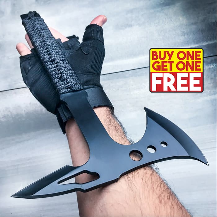 The Ridge Runner Tactical Tomahawk Throwing Axe in the hand