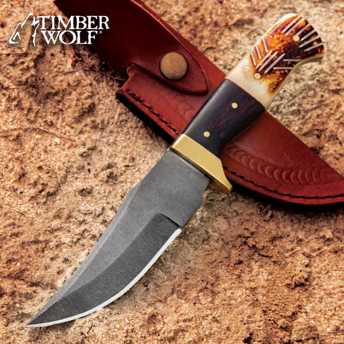 The Timber Wolf Deerstalker Fixed Blade Knife in and out of its sheath
