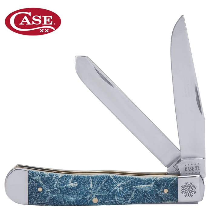 It has bone handle scales that are tinted blue and embellished with a cracked ice pattern in white, accented with nickel silver bolsters