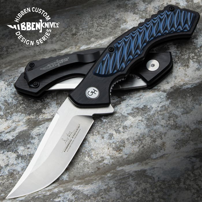 The Hibben Blue Whirlwind Pocket Knife 4 5/8”, when closed, and 7 3/4” when open