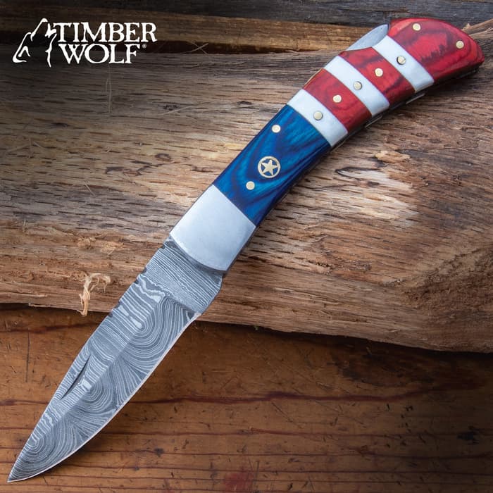 An All-American classic design makes the Timber Wolf USA Tribute Pocket Knife a must-have addition for your collection