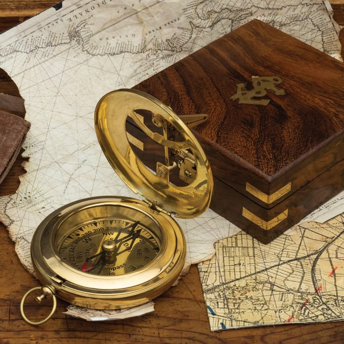 The Brass Sundial Compass shown with its wooden box