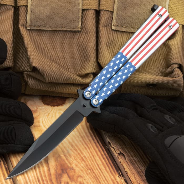 The American Flag Butterfly Knife with its blade deployed